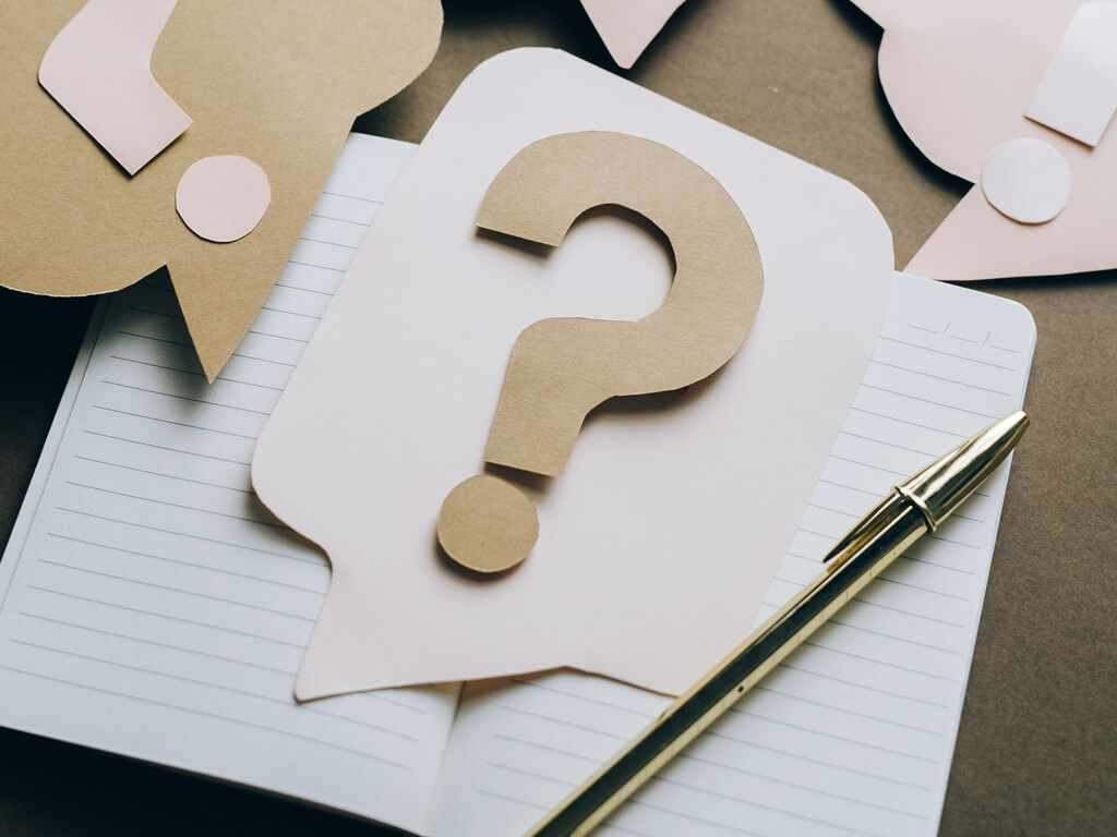 Question mark symbol representing Frequently Asked Questions section of Expert Academy